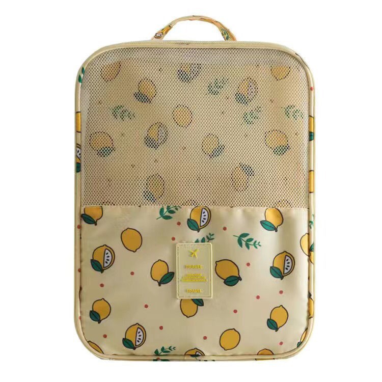 Travel Shoe Storage Bag 3-layer waterproof organizer with lemon pattern design for efficient luggage organization.